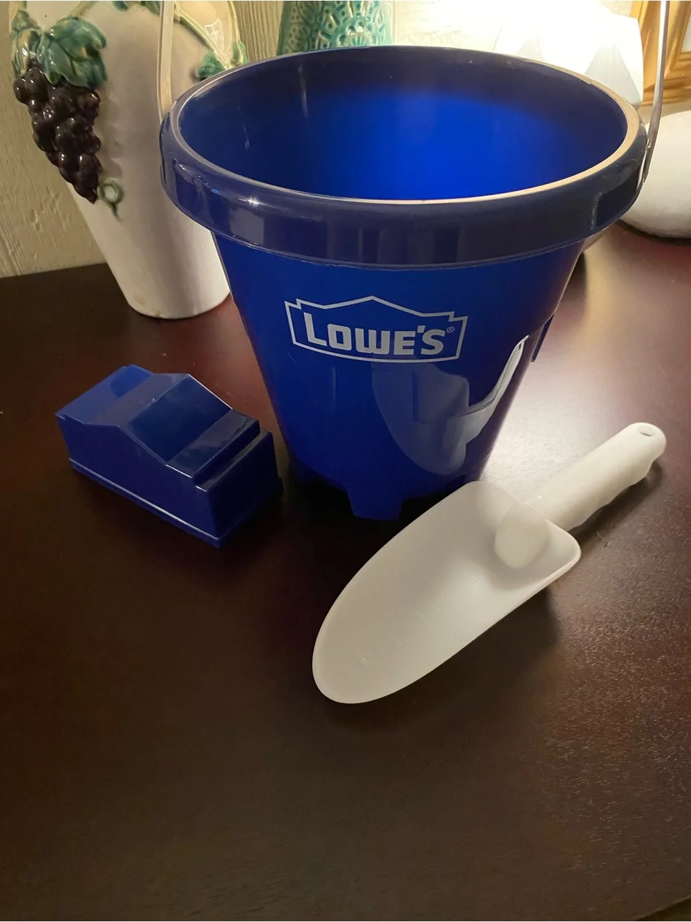 Lowe's Beach/Sandbox Blue Plastic Bucket with White Handle and sand mold.